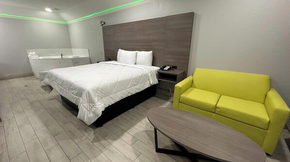 Room, 1 King Bed, Non Smoking, Jetted Tub | Iron/ironing board, free WiFi, bed sheets - Kiwi Inn Capital O Houston - Hwy 249 (Houston)