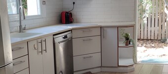 Wake up in this bright apartment near the beach with vibrant energyx