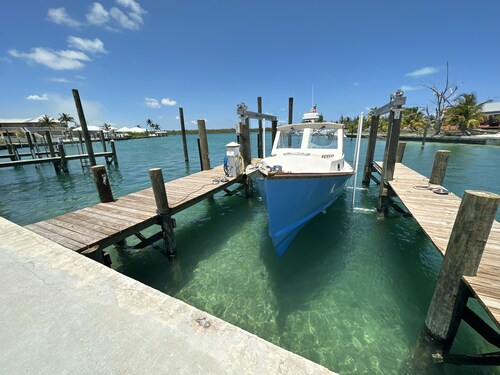 Newly Remodeled Home with Pool on the Harbor with a Beach view an a 22x40 dock. 