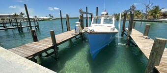 Newly Remodeled Home with Pool on the Harbor with a Beach view an a 22x40 dock. 