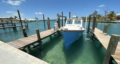 Newly Remodeled Home with Pool on the Harbor with a Beach view an a 22x40 dock.