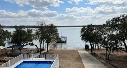 Lakefront Retreat with Pool, on site Private Boat Ramp and 2 slip dock.