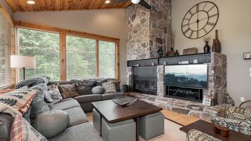 House, Multiple Beds, Hot Tub | Living room | 40-inch TV with cable channels, fireplace