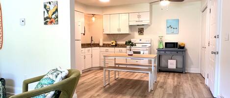 Fridge, microwave, stovetop, coffee/tea maker