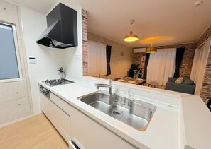 Fridge, microwave, stovetop, cookware/dishes/utensils