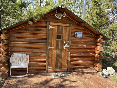 Retreat to our cozy cabin nestled in a private hideaway.
Solar lights & shower