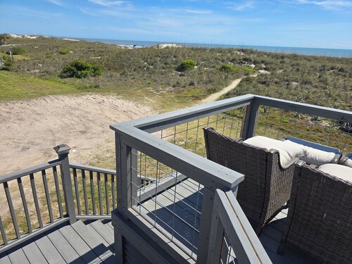 Beach front cottage - don't let the outside fool you - check out the photos! 