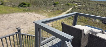 Beach front cottage - don't let the outside fool you - check out the photos! 