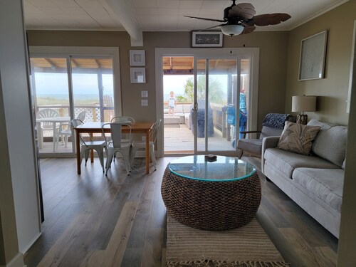 Beach front cottage - don't let the outside fool you - check out the photos! 