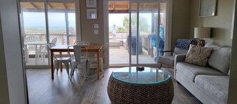Beach front cottage - don't let the outside fool you - check out the photos! 