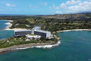 Situated on a small island, this coastal hotel offers stunning views of the surrounding waters and beach.