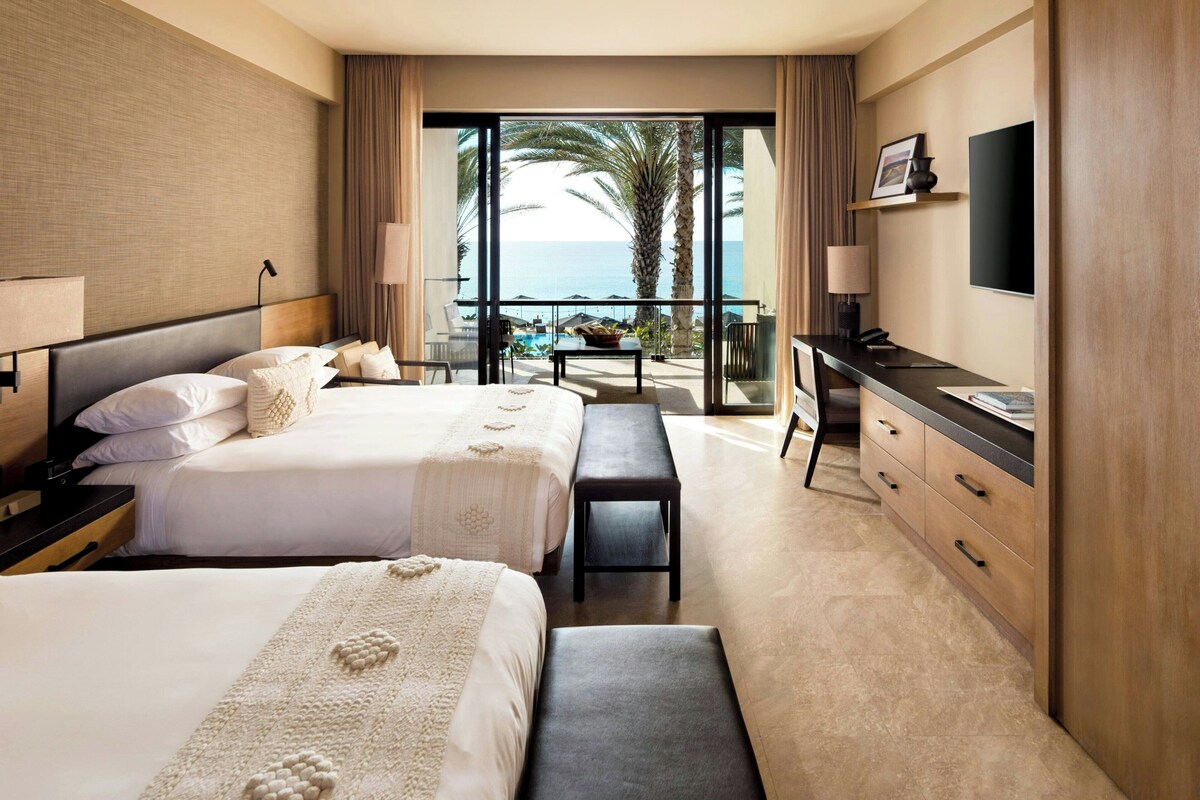 Deluxe Room, 2 Double Beds, Ocean View | Minibar, in-room safe, desk, laptop workspace