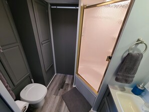 Combined shower/bathtub, hair dryer, towels, soap - The Air Bee-N-Bee: In The Heart of the Black Hills (Custer)