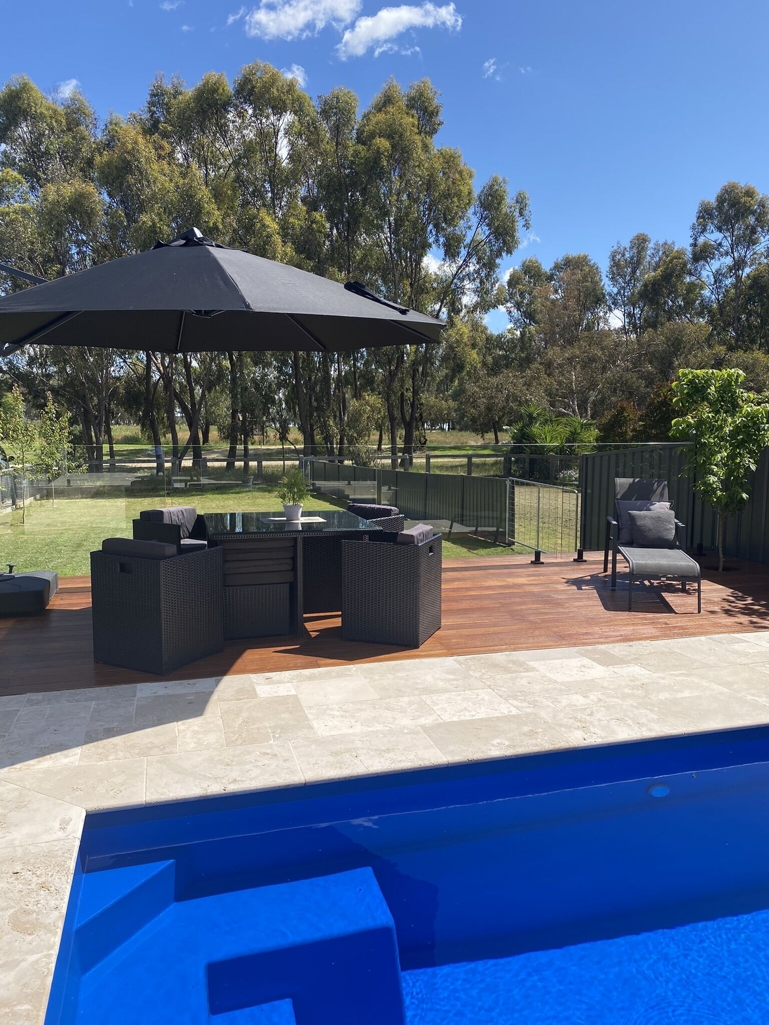 Expansive pool space, sun lounge (not in photo) and pool fridge. 