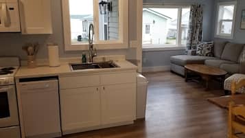 Coffee/tea maker, fridge, microwave, oven