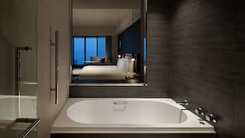 Separate bathtub and shower, rainfall showerhead, free toiletries