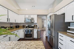 Fridge, microwave, oven, stovetop - Dream Retreat-Remodeled 4BR w/ Pool & Spa and MORE (North Las Vegas)