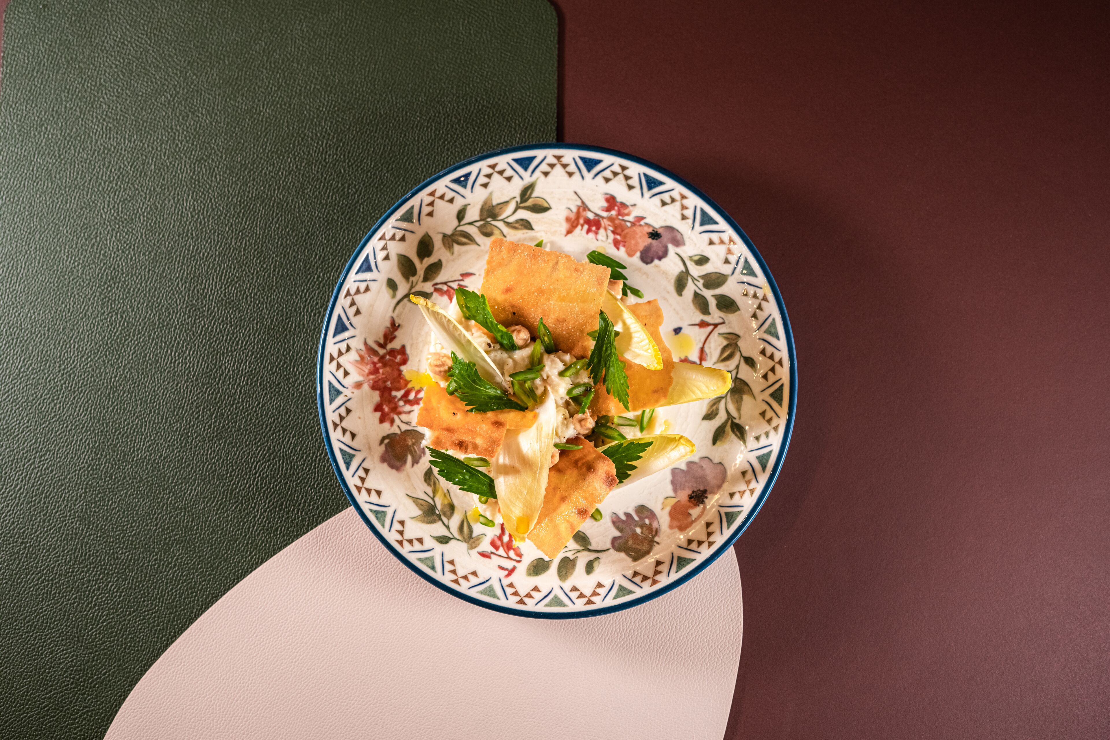 A plate with food on a table.