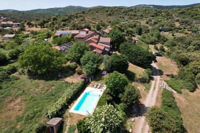 Two character houses in a hamlet with swimming pool and large garden