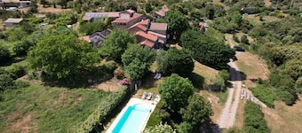 Two character houses in a hamlet with swimming pool and large garden