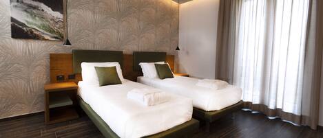 1 bedroom, premium bedding, down comforters, pillowtop beds