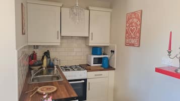 Apartment | Private kitchen | Fridge, microwave, oven, stovetop