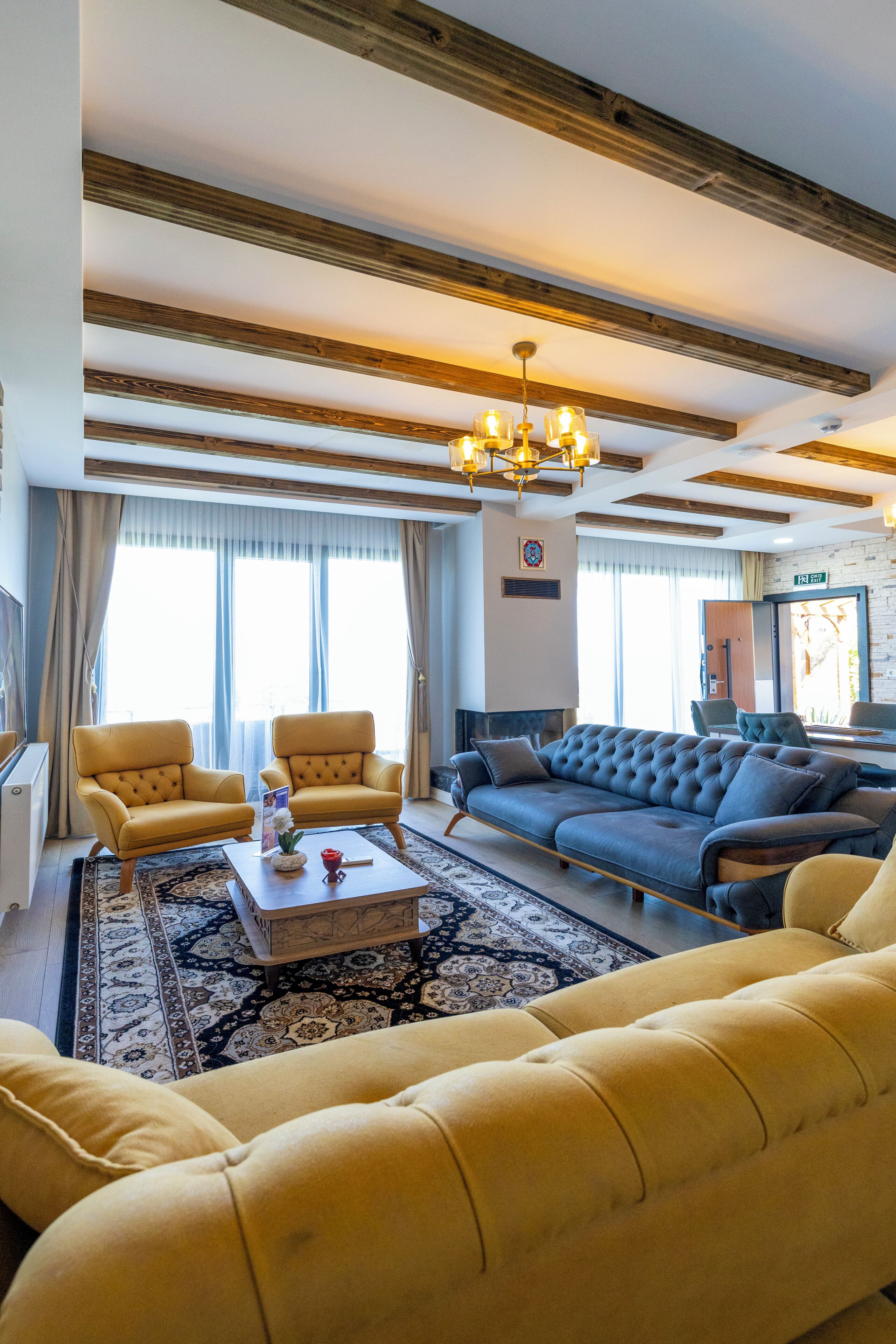 Luxury Duplex | Living area | 60-inch LED TV with satellite channels, fireplace, video-game console
