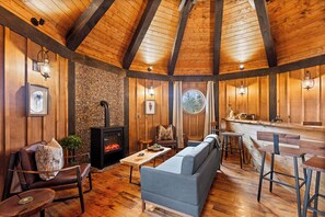 Luxury Tree House, Multiple Beds, Non Smoking, Mountain View | Living area | Fireplace - Ancient Lore Village (Knoxville)