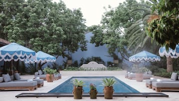Outdoor pool, pool umbrellas, pool loungers