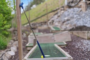 Property grounds - New Listing! MINI GOLF! 2BR/2BA Cabin w/HT, Fire Pit, Dog Run & Game Room! (Sevierville)