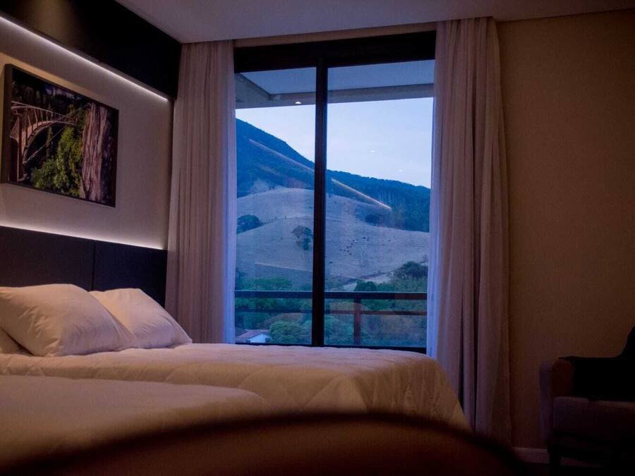 Deluxe Quadruple Room | Hypo-allergenic bedding, minibar, in-room safe, desk