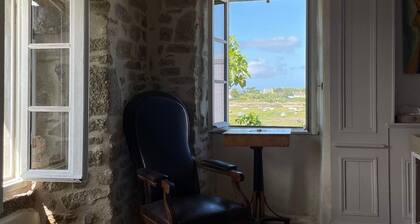 Maison les pieds dans l'eau