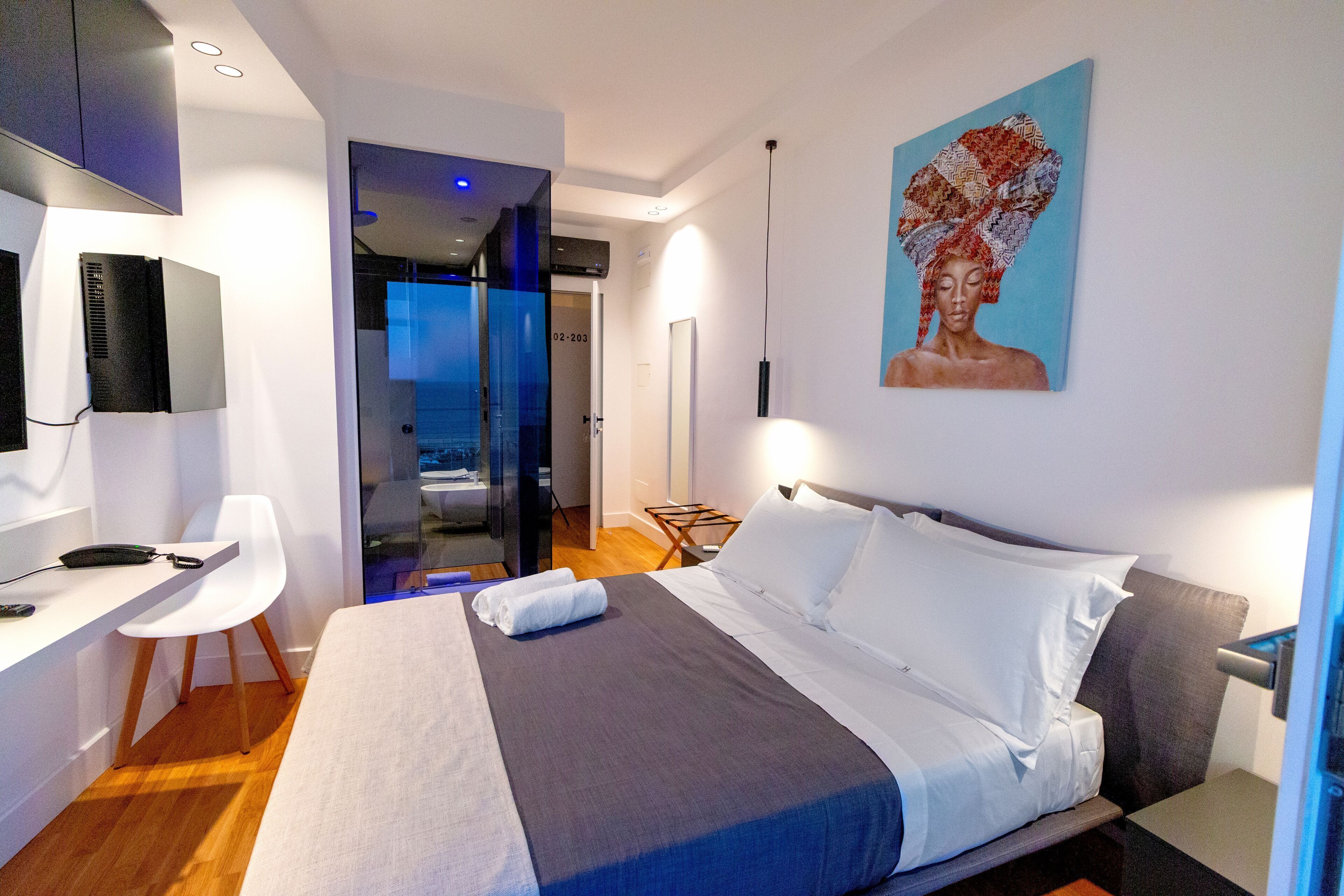 Premium bedding, down comforters, in-room safe, desk