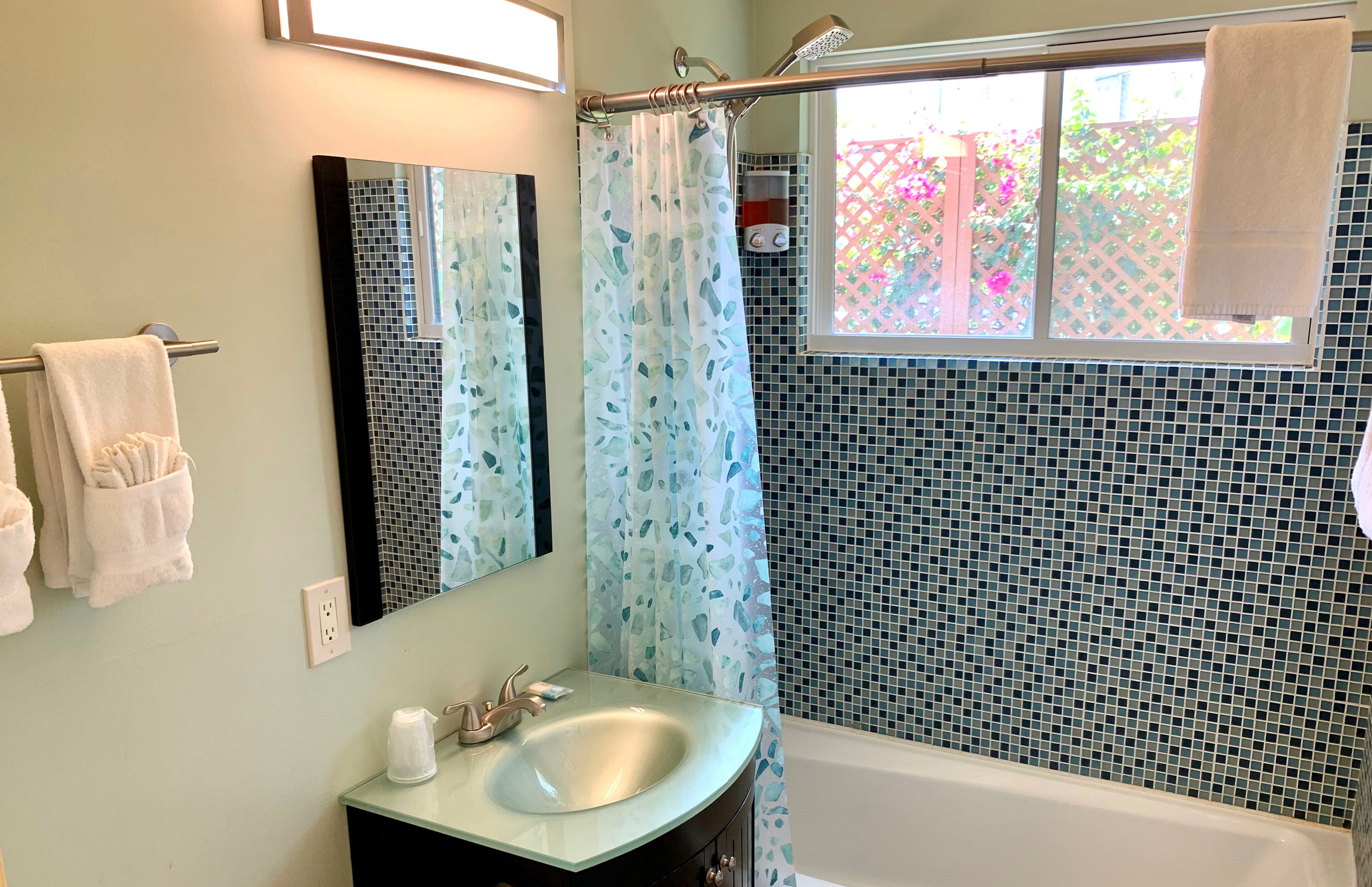 condo | bathroom | hair dryer, towels, soap, shampoo