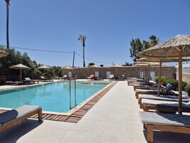 2 outdoor pools, open 10:00 AM to 6:00 PM, pool umbrellas, sun loungers