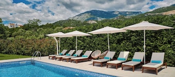 Captivating 4BD Villa with Outdoor Pool and Garden