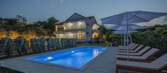 Captivating 4BD Villa with Outdoor Pool and Garden