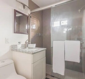 Shower, hair dryer, towels, soap