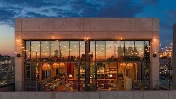 Experience the city from our expansive glass facade, offering unobstructed views of the cityscape.
