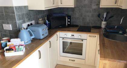 Seaside two bedroom flat with parking opposite path onto beach