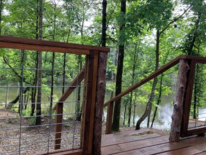 Property grounds - Tiny Cabin. Come here to unplug & relax on the pond. (Garvin)