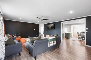 Smart TV, fireplace, books