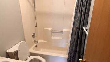 Combined shower/tub, hair dryer, towels, soap