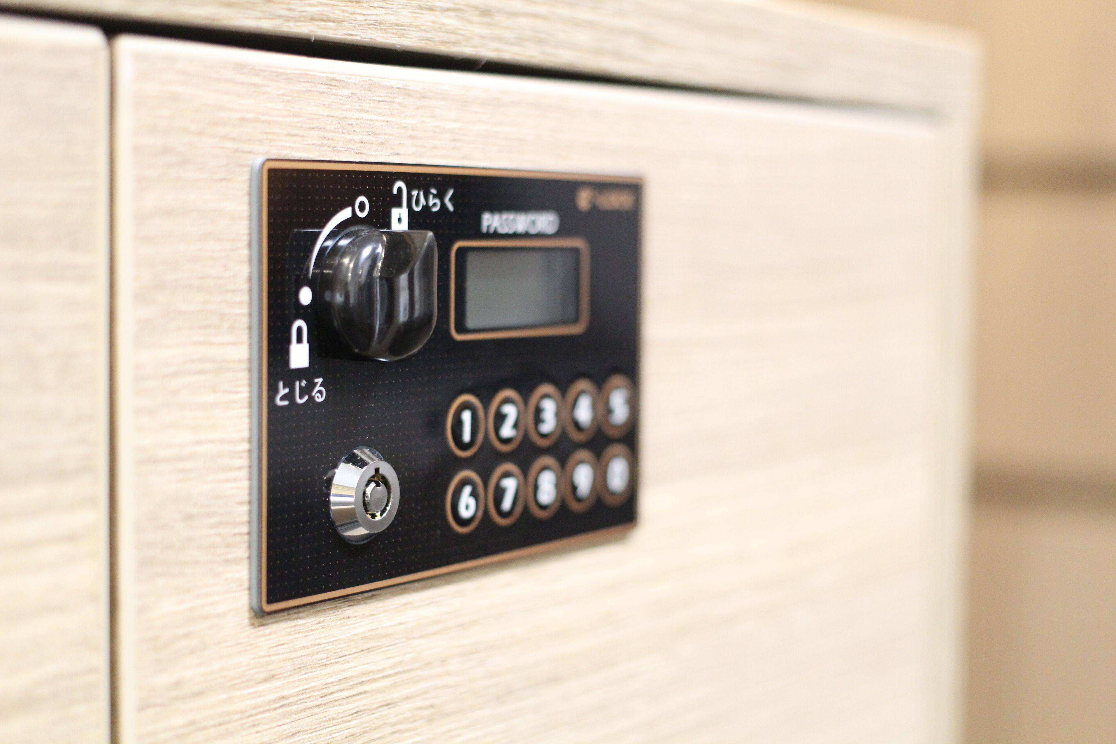 A keypad with a numeric keypad and a lock mechanism, likely for a secure entry system.
