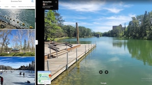 A serene lake with a wooden dock extending into the water, surrounded by lush greenery and a clear sky. - G@Home Quiet 5BR4BA Retreat, Gateway to Banff & COP & Hwy 1 (Calgary)