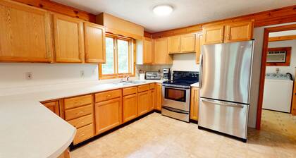 Secluded riverfront property with fast WiFi, kayak & wood stove - dog-friendly