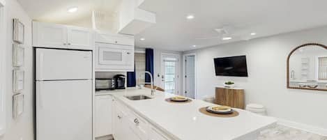 Fridge, microwave, coffee/tea maker, toaster