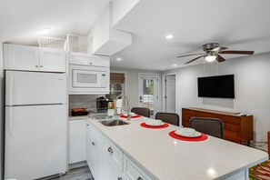 Fridge, microwave, coffee/tea maker, toaster