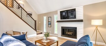 Dog-friendly home with deck, gas fireplace, central AC, & washer/dryer