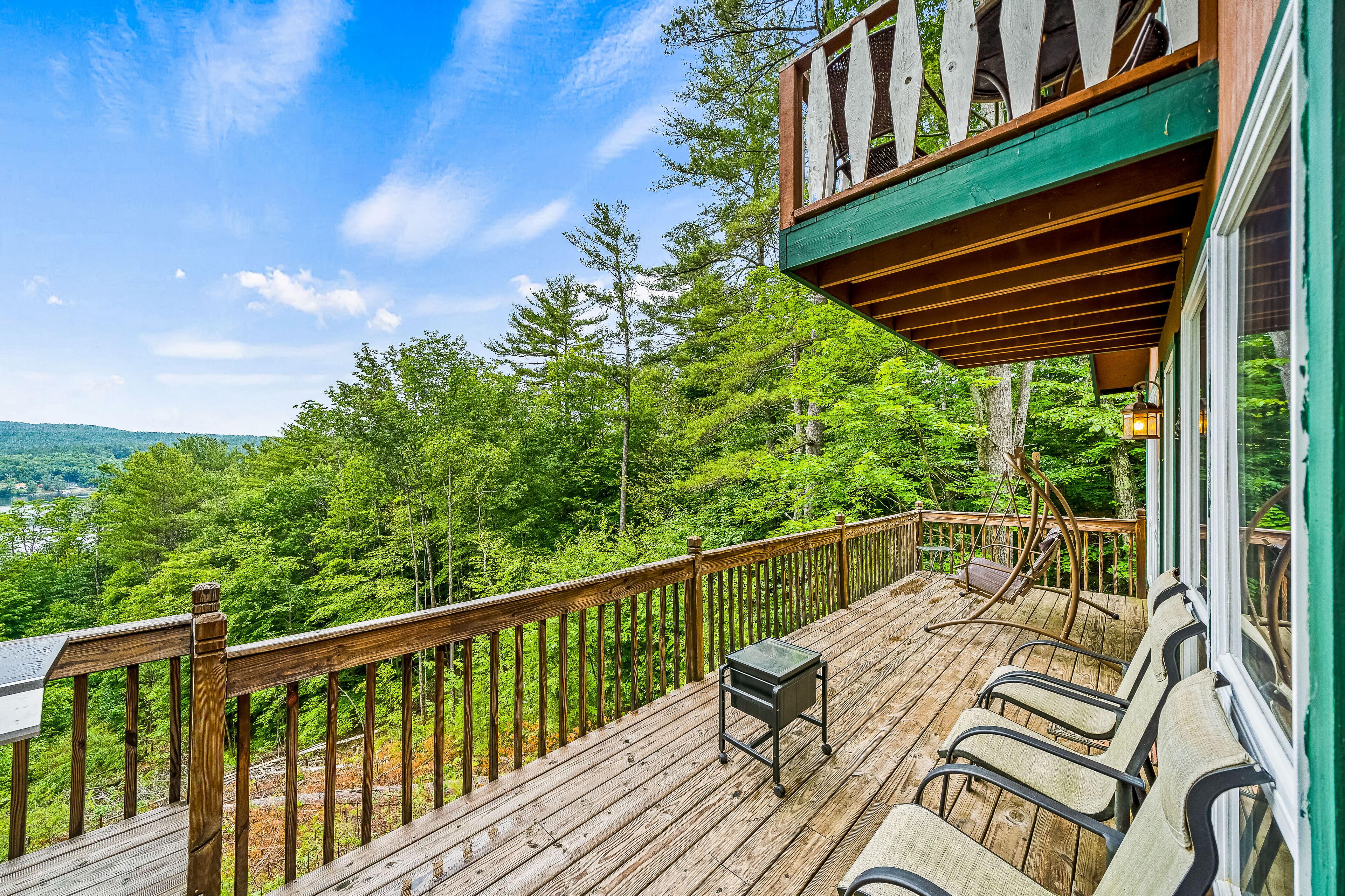 Secluded cabin with dock, wraparound deck, gorgeous view & enclosed porch